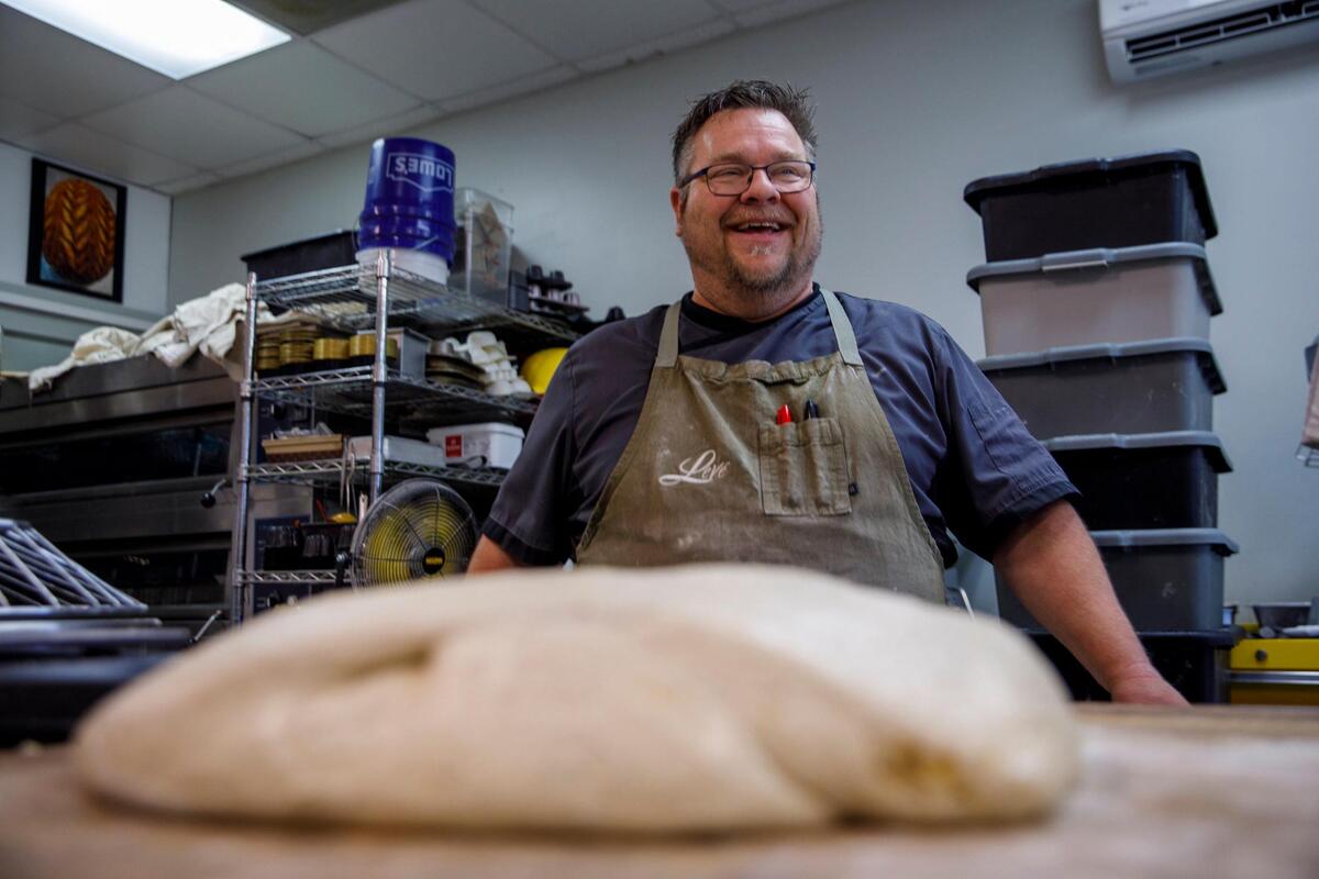 Chef Geoff Blount makes loaves of sour dough bread at Leve’ Bakery. Leve’ Bakery prepares sour dough bread for their retail shop and farmers market. They prepare 50 to 60 loaves a day. Oct. 23, 2024.