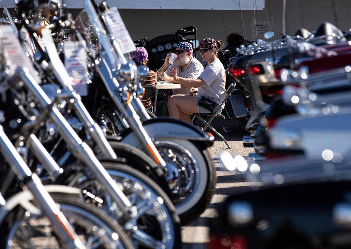 The Witt family from Goode, Virginia have breakfast month the bikes at the Harley Shop at the Beach in North Myrtle Beach, S.C. A breakfast meet was held at the Harley Shop at the Beach as part of the Myrtle Beach Bike Week Fall Rally on Thursday. The rally runs from Sept. 28 - Oct. 4 with events being held at many Grand Strand businesses. October 1, 2020.
