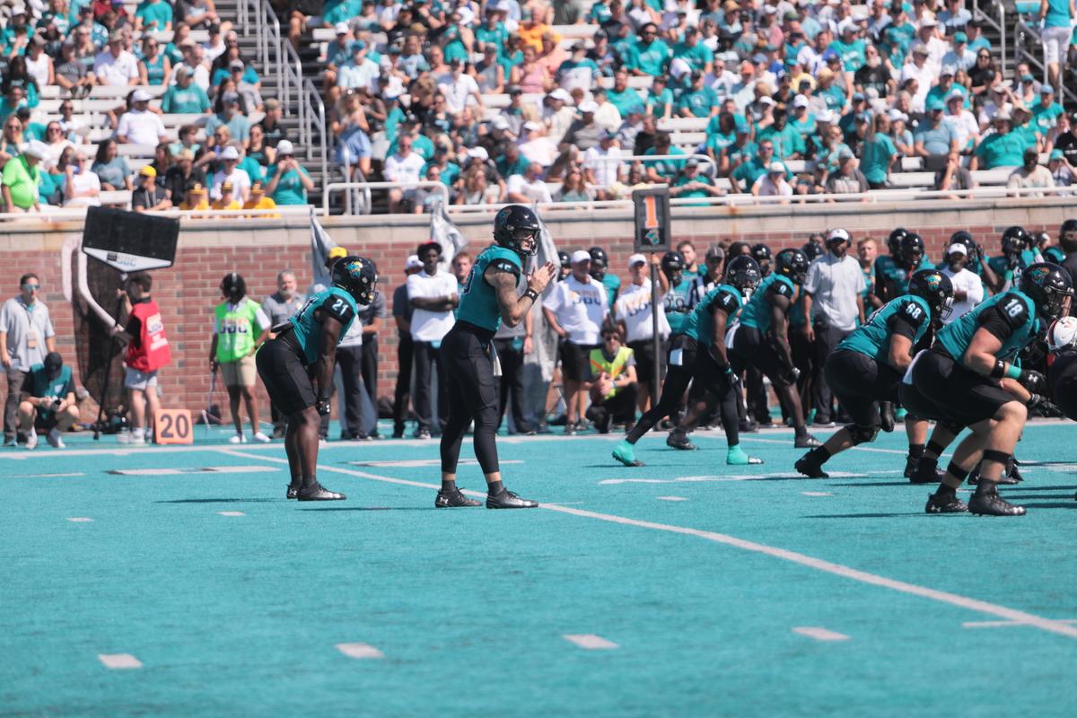 Coastal Carolina University Ethan Vasko prepares to take a snap in CCU’s loss to the University of Virginia Cavaliers in Conway, S.C. Brooks Stadium Saturday, Sept. 21, 2024.
