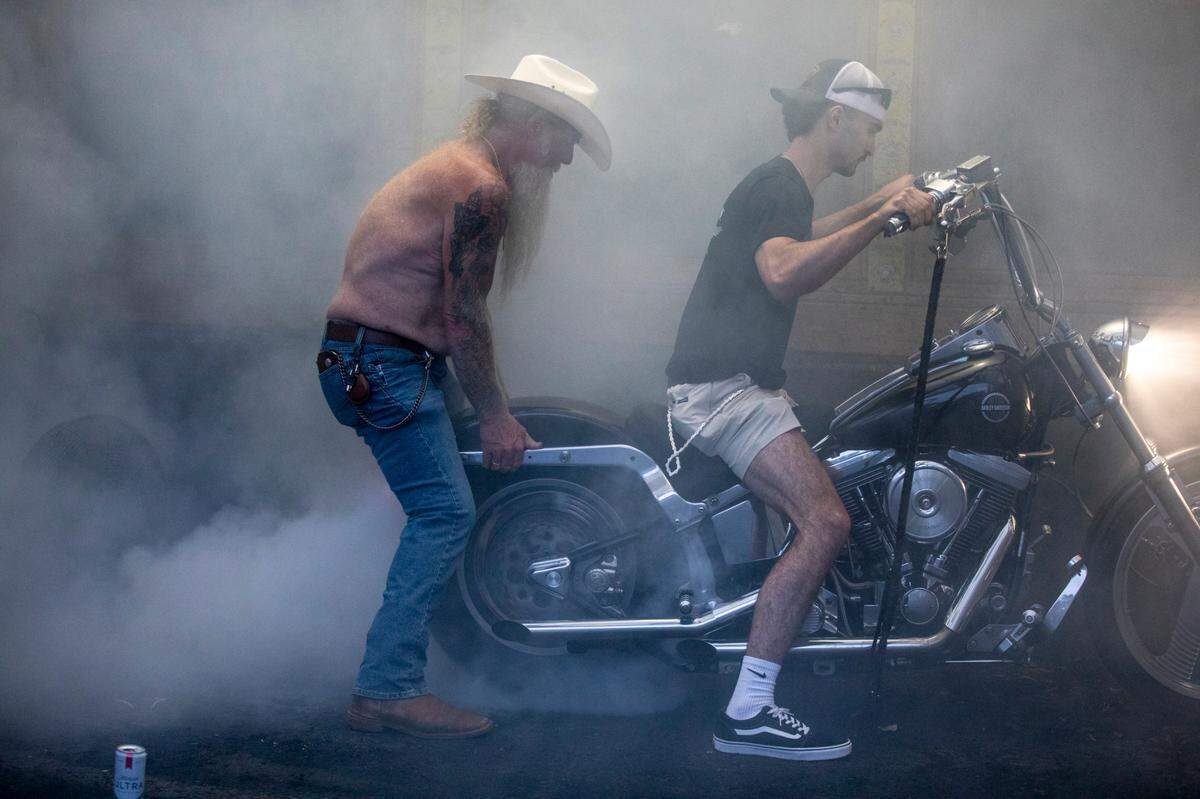 Bikers hang out at Suck Bang Blow in Murrells Inlet, S.C. on Friday during the 2024 Myrtle Beach Spring Rally. The entertainment included a burnout contest and live bands. May 17, 2024. 
