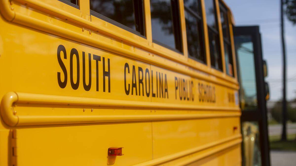 School buses sit lined up at North Myrtle Beach High School