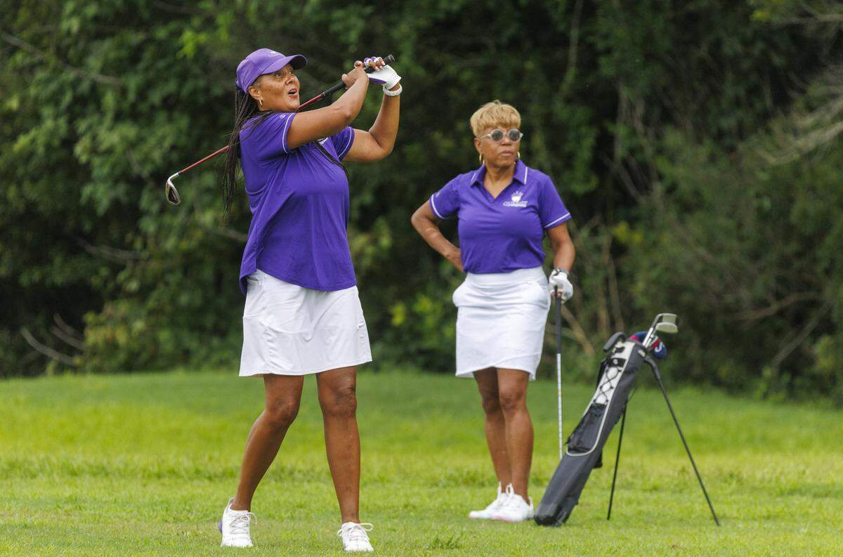Celisse Lundy, left a member of the Myrtle Beach chapter of Queens on the Greens tees off for a round of afternoon play at Wild Wing Plantation in Conway, SC on August 12, 2025. The group is part of a larger organization that began in Maryland designed to offer women of color a chance to get together to play golf, learn how to play golf and socialize. The women, which range from beginners to advanced players, usually play nine holes and then go out to eat after golfing. Local chapter founder Celisse Lundy said, "There’s no judgement. Just fellowship and playing golf.". Aug. 12, 2025.