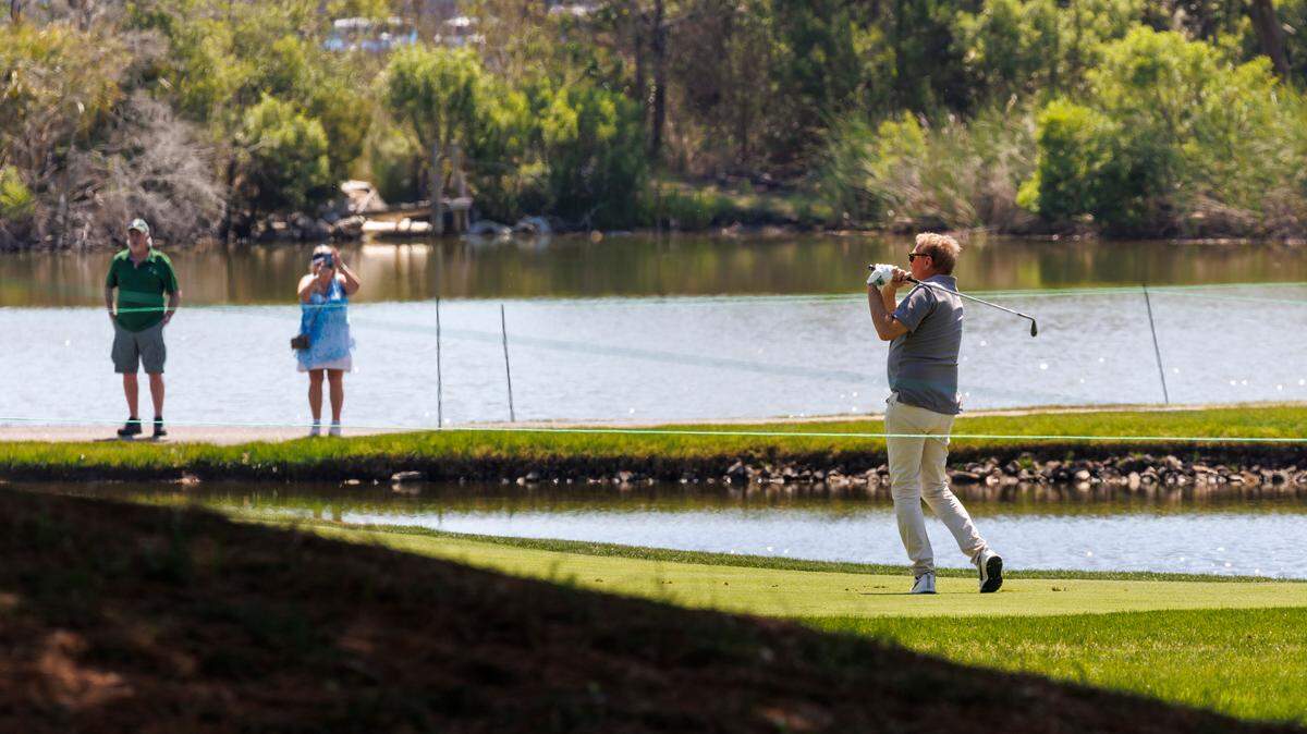 Kevin Costner hits a fairway shot over water at The Dunes Golf and Beach Club on Wednesday. Celebrities tee off at the 2025 ONEflight Myrtle Beach Classic Celebrity Pro-Am tournament on Wednesday at the Dunes Golf and Beach Club in Myrtle Beach. More than twenty celebrities including Kurt Russell, Kevin Costner and Vanna White. The full tournament is being played Thursday through Sunday in Myrtle Beach, SC. May 7, 2025.