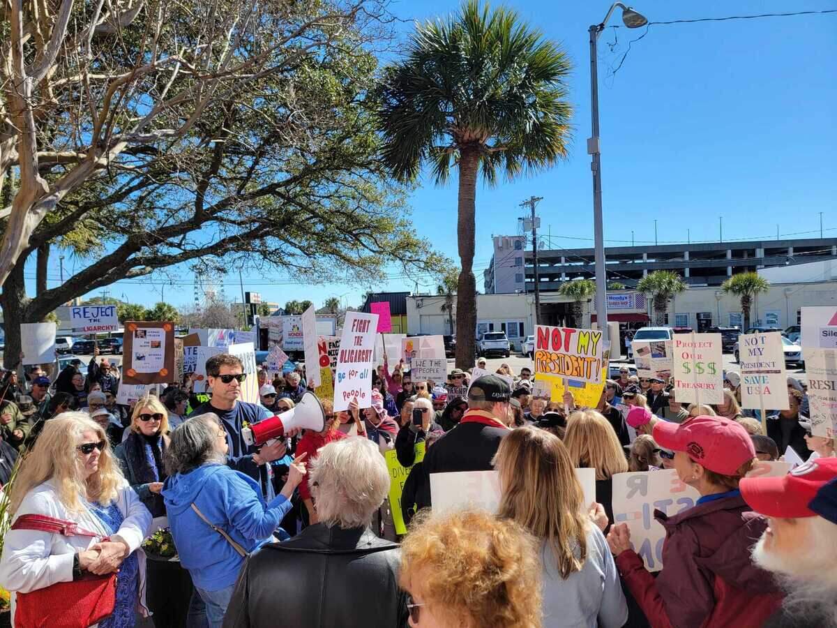 Demonstrators took to Myrtle Beach City Hall on Monday, Feb. 17, 2025 in one of dozens of President’s Day protests across the United States.