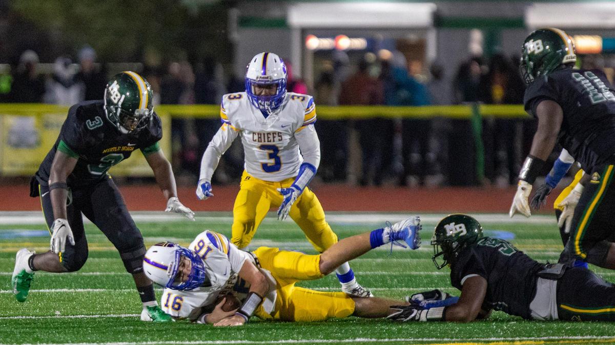 Myrtle Beach senior defensive lineman J.B. Favorite sacks North Myrtle Beach senior quarterback Cason McClendon Friday night at Doug Shaw Memorial Stadium.