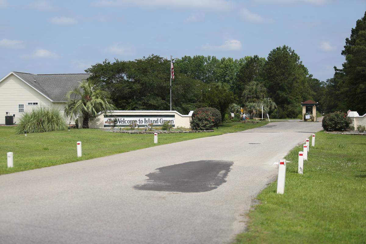 The entrance to the Island Green community, in Burgess. Island Green residents have complained for years about poor road conditions and the fact that Sunnehanna Drive is the only road in and out for 1,200 homes.