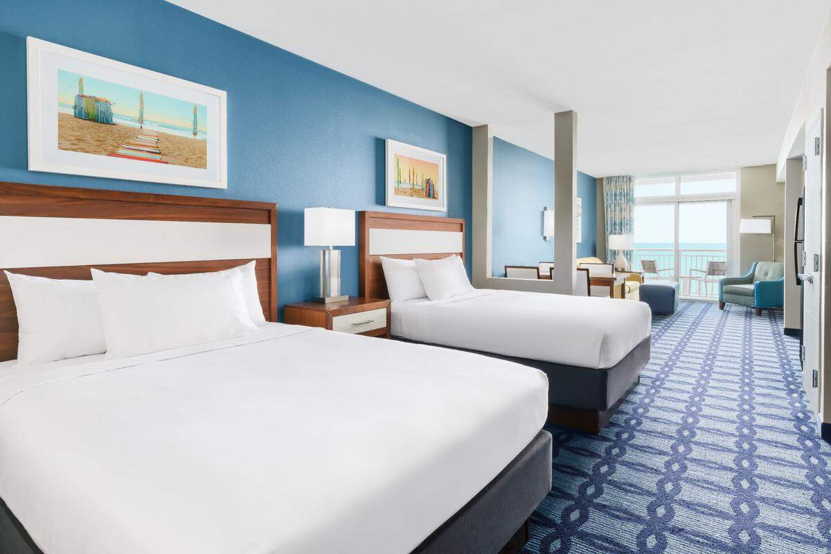 A room with two queen beds at the Homewood Suites by Hilton Myrtle Beach Oceanfront.