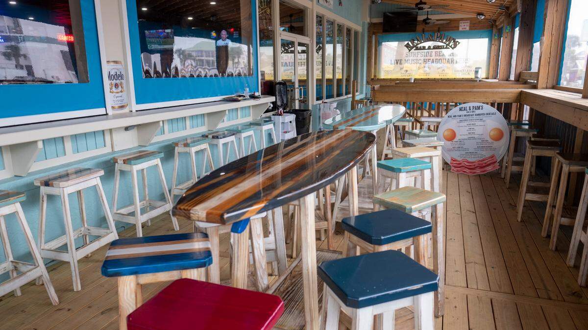 Neal and Pam’s Bar and Grill in Surfside Beach, S.C. which was damaged by fire in July 2022 reopened Monday. March 27, 2022.