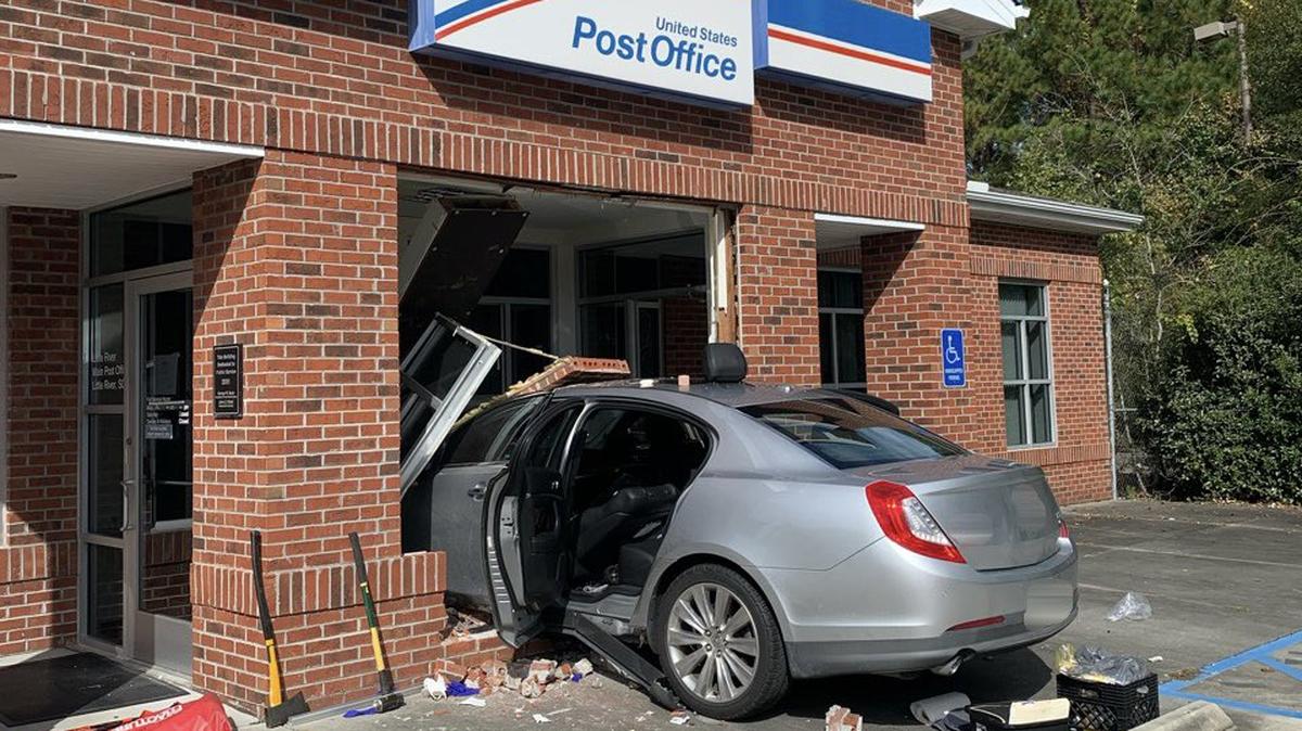 One person had to be extricated from a car after wrecking into a post office building in Little River.