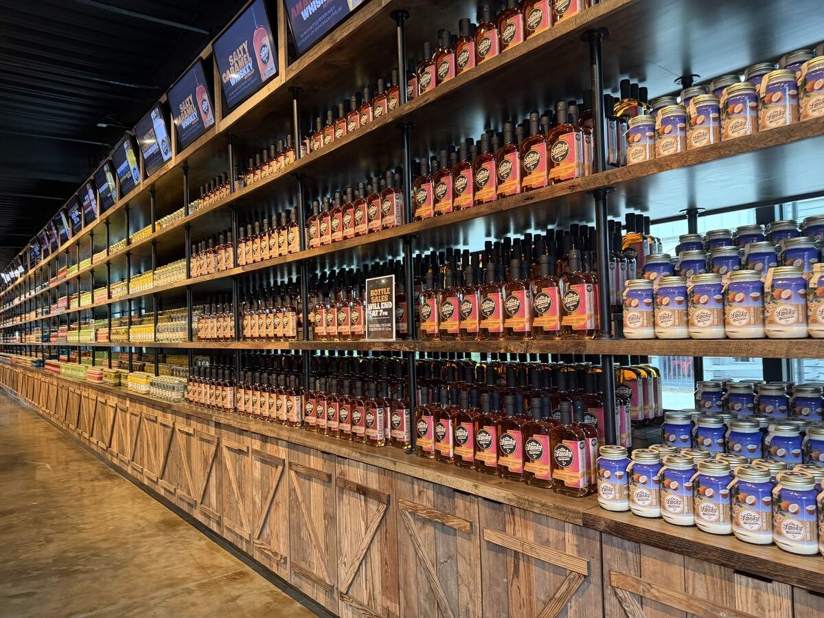 Ole Smoky Distillery and Yee-Haw Brewing Co. features a wall of moonshine and whisky distilled by Ole Smoky Distillery. Flavors range from clear, high proof moonshine to fruity infusions.