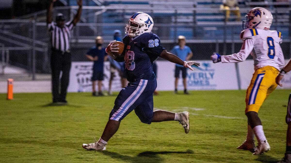 Aynor’s Ahmad Gerald runs for a touchdown against Loris. The Blue Jackets hosted Loris on Friday night for their 2020 homecoming game. October 23, 2020.