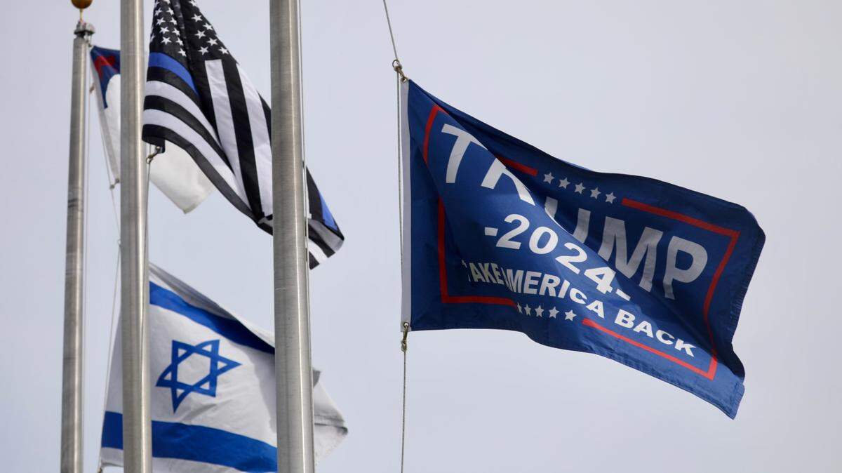 A 2024 Trump flag flies outside the Conference Center at Barefoot Resort in North Myrtle Beach on Wednesday, Oct. 9, 2024. The center will become a polling place where people will vote on election day in less than a month. According to South Carolina state law, the flag must be lowered and cannot fly on election day at the polling center.