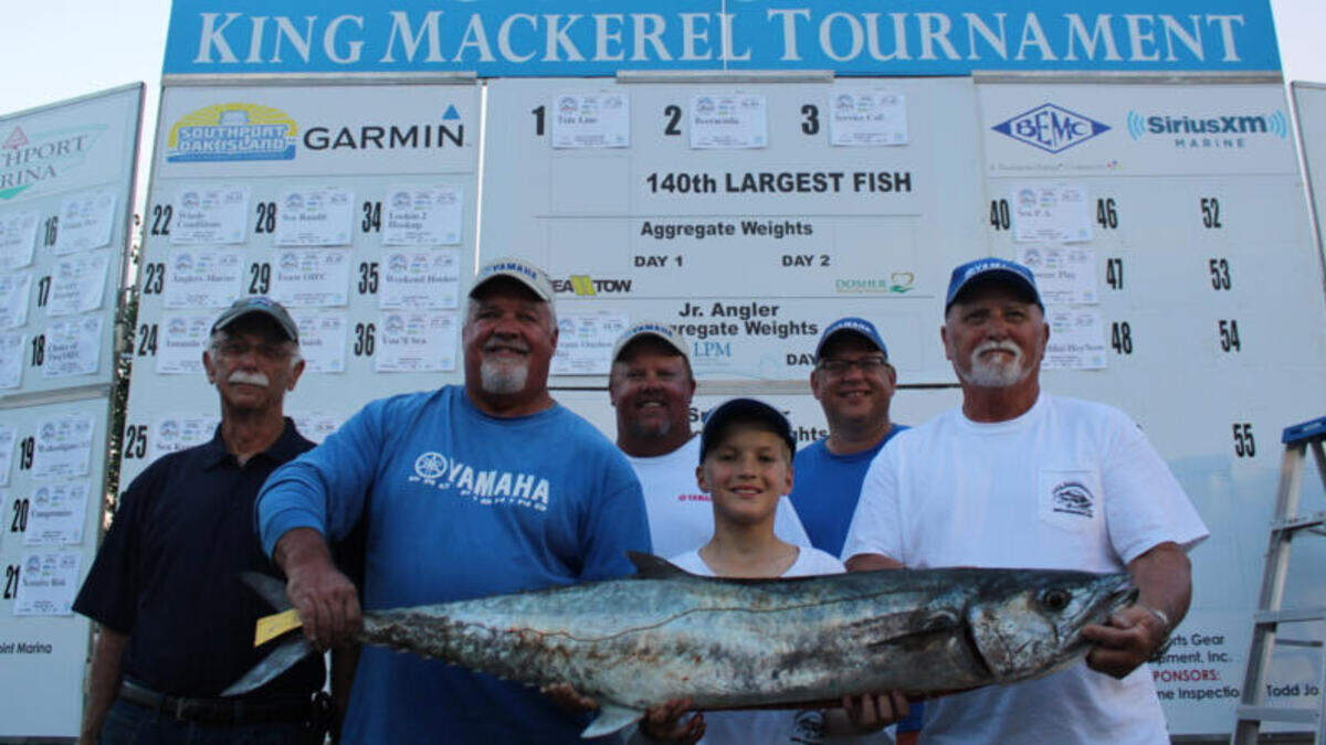 The crew of Tide Line shows off the winning 37.20-pound king mackerel last Saturday in the 40th annual U.S. Open King Mackerel Tournament out of Southport, N.C.