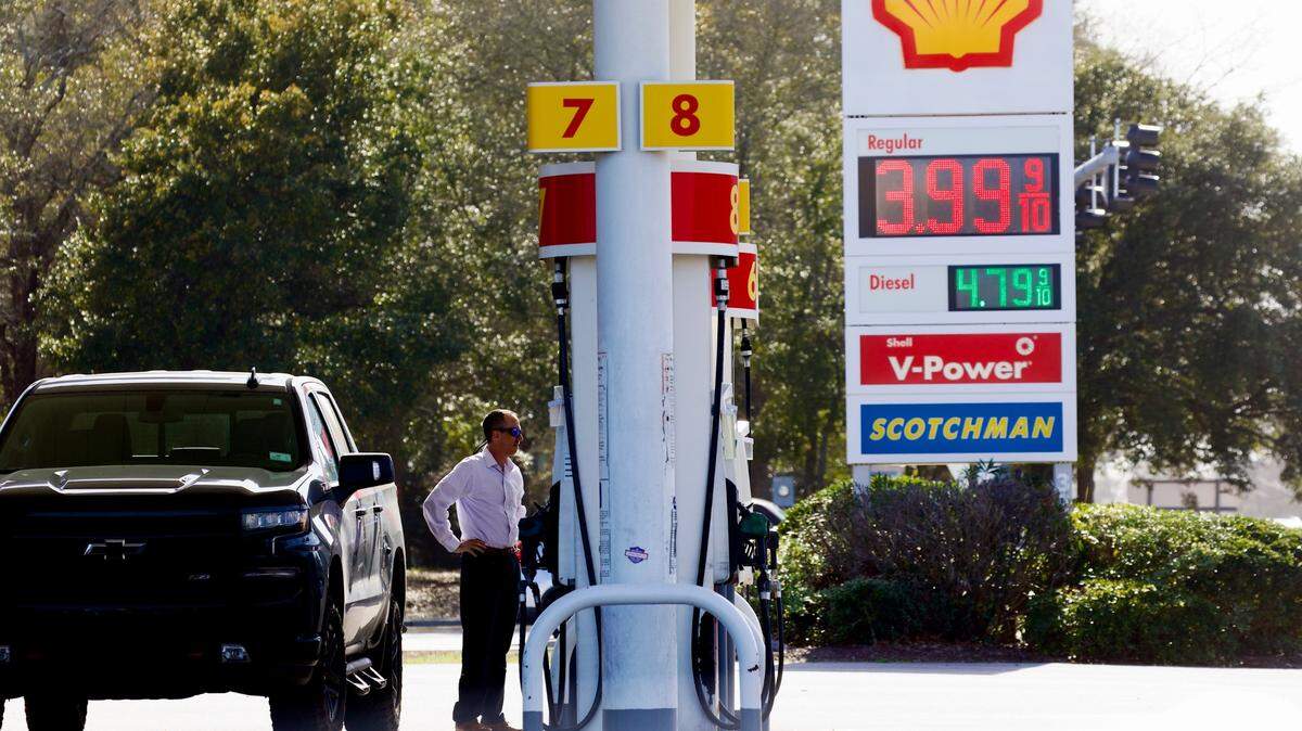 Myrtle Beach gas prices have soared to close to $4 as the Russian invasion of Ukraine causes fuel costs to spike around the world. On March 7, 2022, a man buys fuel at the Scotchman Shell in Myrtle Beach, where the cost of regular gasoline is $.399.