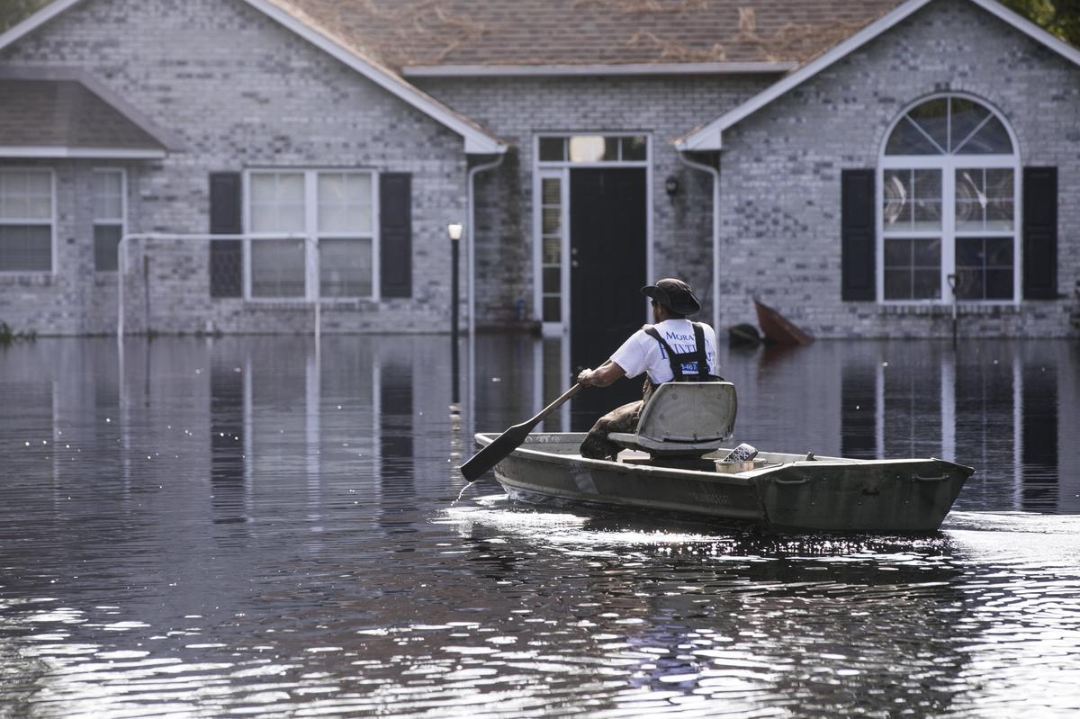 Henry Mora visits his flooded home that had never flooded in six years. “It just happened overnight, he said. It’s really really painful.” Water began flooding the small community of Longs late in the week touching some homes that did not expect to suffer the flood’s wrath. September 21, 2018.