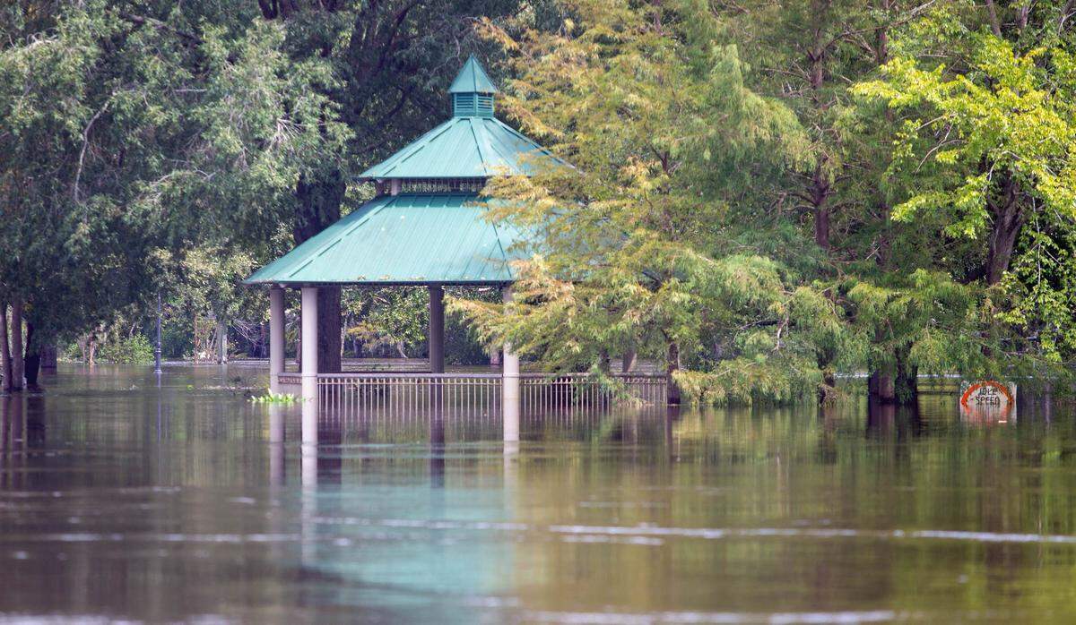 The Conway Riverwalk gazebo sits nearly submerged on Monday. The COnway area is already experiencing flooding Monday after Tropical Depression Florence.