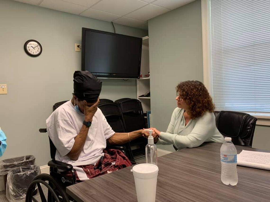Myrtle Beach Mayor Brenda Bethune speaks to Julian Betton on May 31. Betton was left paralyzed after a police raid at his Myrtle Beach home in April 2015.