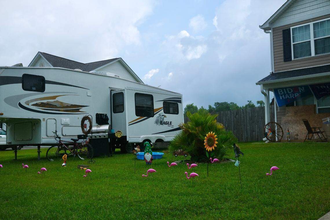 This Little River house has continually added lawn decorations to demonstrate their property rights after dealing with HOA problems for years. The house is next to but not in an HOA. The final straw was when they put a trailer in the front yard and an HOA member called the county. July 10, 2024