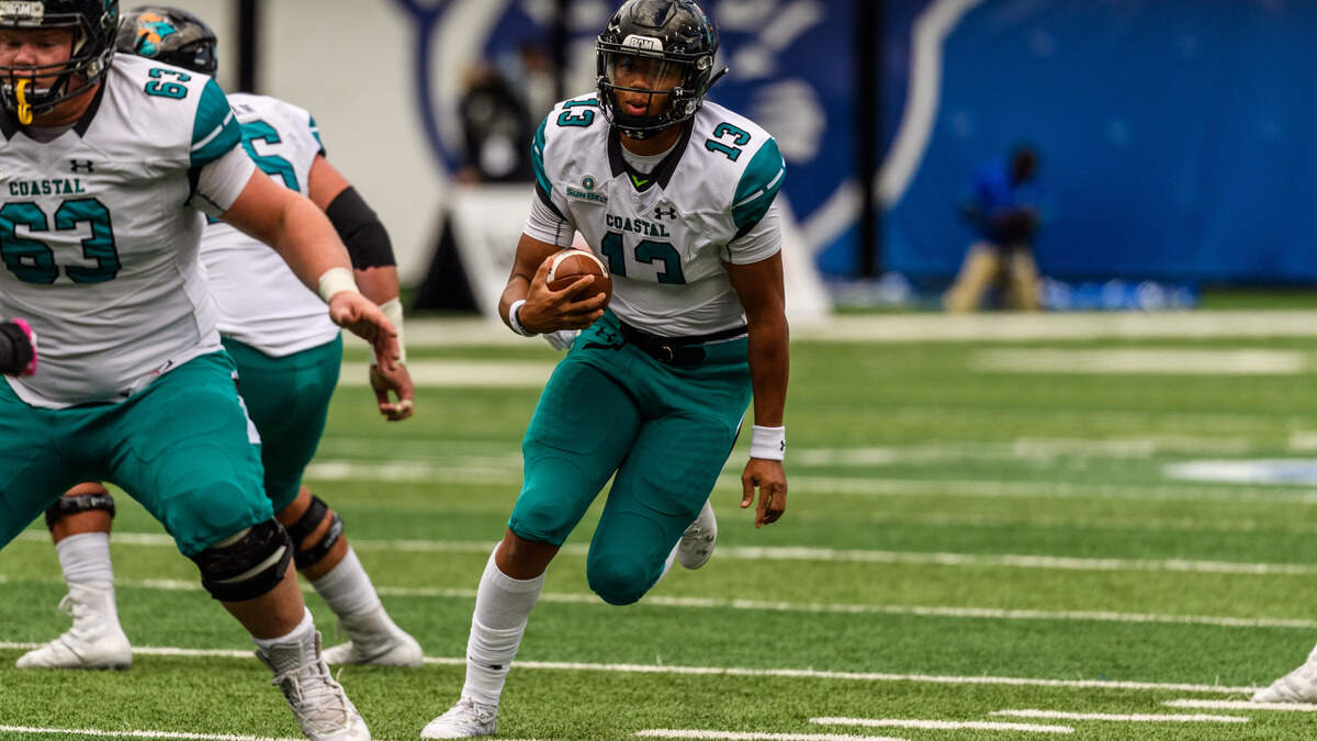Coastal Carolina freshman quarterback Fred Payton runs for yardage against Georgia State in Atlanta on Saturday.