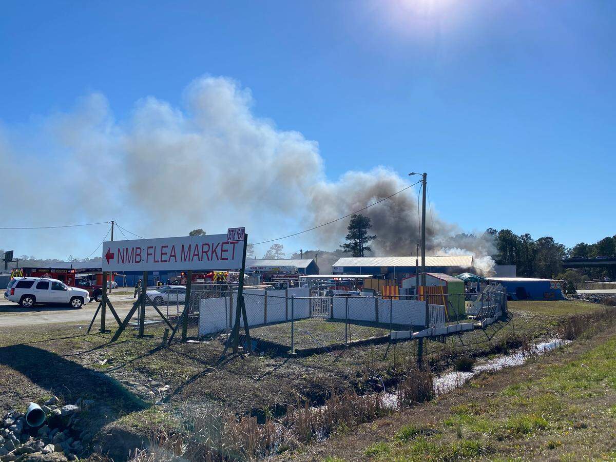Firefighters respond to a flea market fire in north myrtle beach in the grand strand, sc. The fire was ongoing as of 2:30 p.m. as Horry County Fire Rescue fought to get the blaze under control