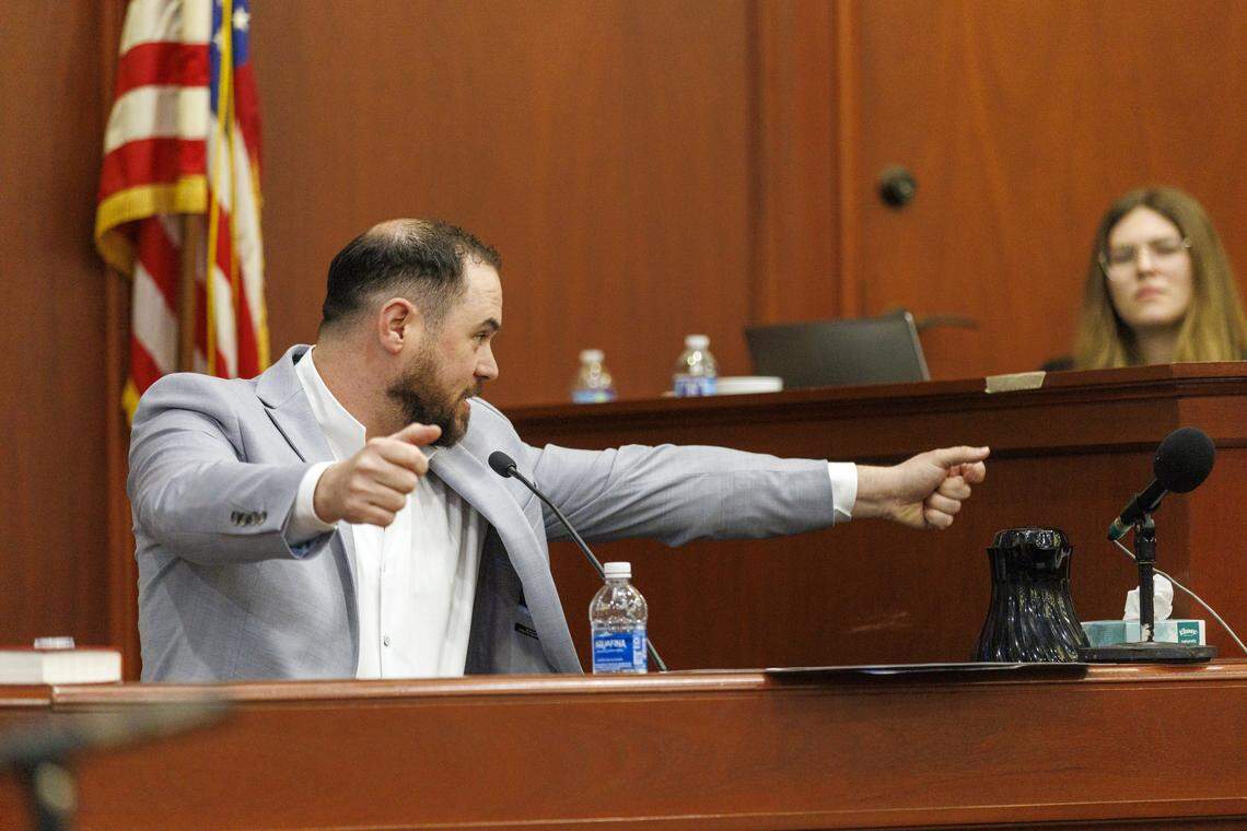 On Feb. 19, the third day of the Stand Your Ground hearing in Horry County, Weldon Boyd demonstrate for a judge the way he says Scott Spivey was pointing a weapon during the drive that preceded Spivey being shot and killed nearly three years ago.