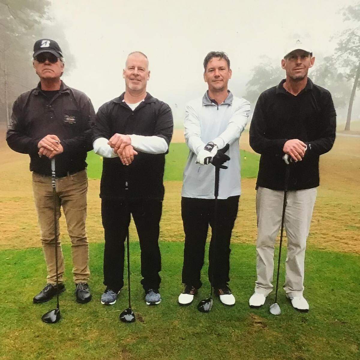 Greg Rice (far right) at a golf outing with friends. Rice was founded murdered in Horry County.