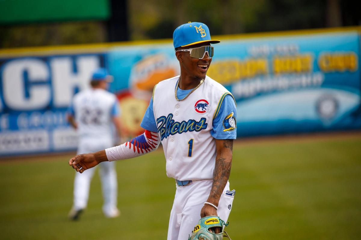 Myrtle Beach Pelicans second baseman Yeison Santana jokes with fellow players during practice on April 5, 2022 on TicketReturn.com Field at Pelicans Ballpark.