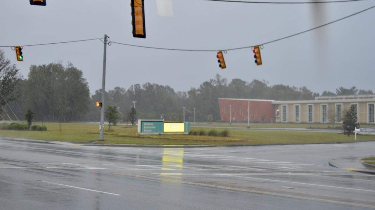 Winds from Hurricane Ian were strong enough to make the traffic lights on Socastee Boulevard sway Friday morning. This photo was taken a few hours before the peak impact is expected.