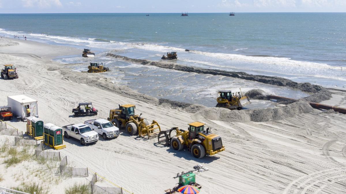The last beach renourishment project in the Grand Strand pumped 1.4 million cubic yards of sand along beaches in 2018. Now, beachgoers are witnessing offshore staging begin for a new renourishment project, which will wrap up in summer 2026. TSN 2018 File. 