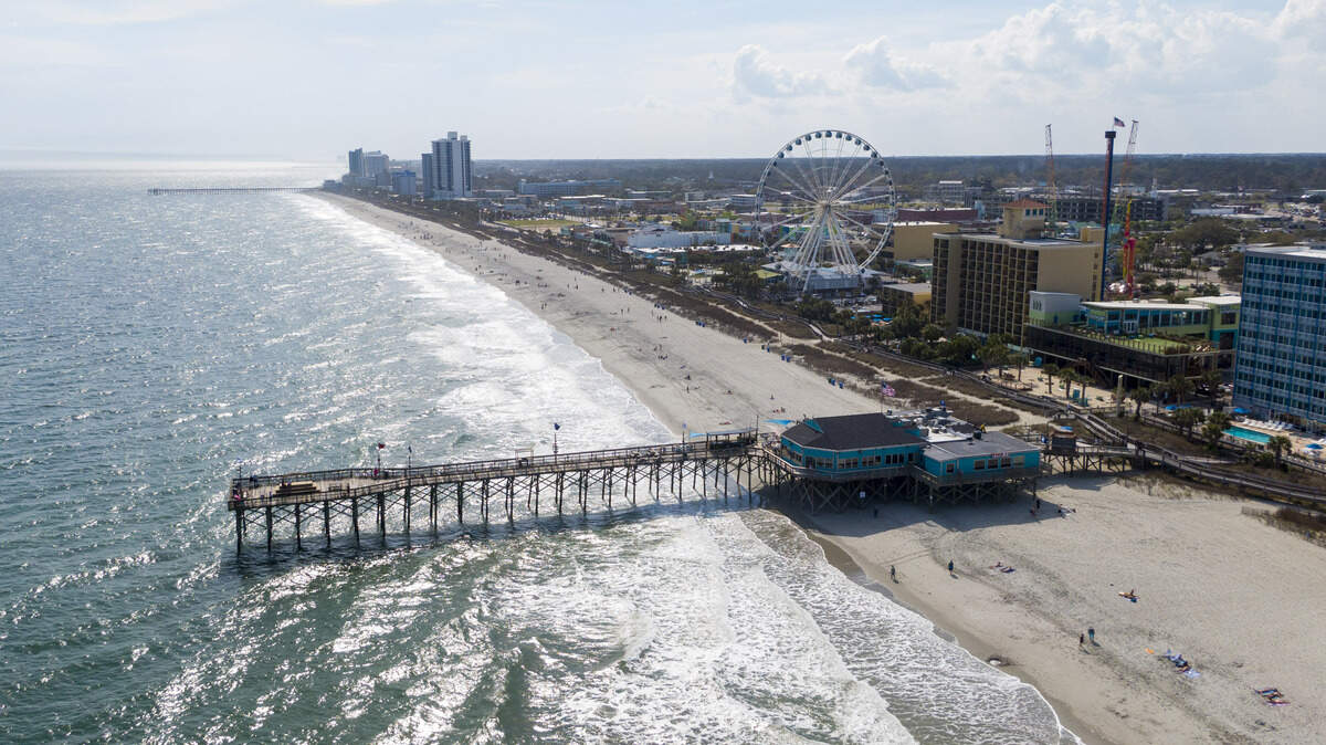 Myrtle Beach visitors and residents flocked to beaches Thursday afternoon amidst a global Coronavirus pandemic.
