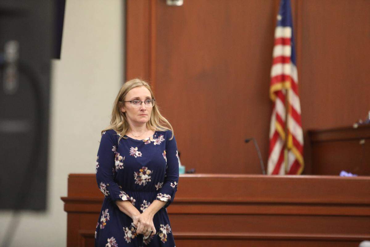 Erica Dontell walks off the witness stand after testifying against Meagan Jackson. Jackson is being tried for murder in connection to the death of her ex-boyfriend. Jackson also had an affair with Dontell’s husband.