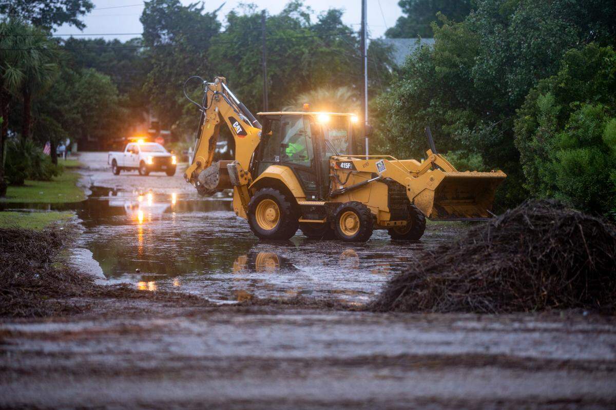 Flooding and storm surge from Hurricane Isaias damaged docks in the Cherry Grove area canals and left a debris field on the beach in North Myrtle Beach after a section of pier collapsed and sand dune walkways were destroyed. August 4, 2020.