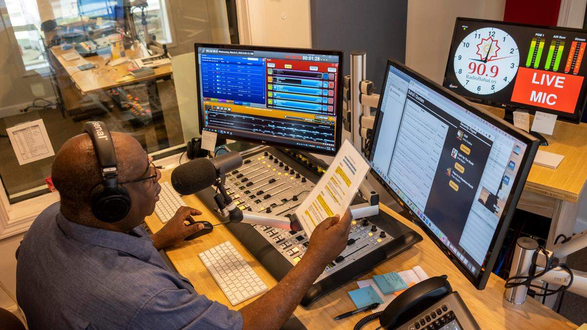 Ernest Hilton, Operation Manager of Radio Baha’i records for his show. Radio Baha’i has been transmitting uplifting music for almost 40 years from its Hemingway, S.C. station. March 8, 2023.