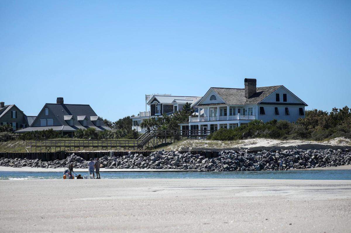From the Southernmost tip of Pawley’s Island fisherman fish in the inlet between Pawley’s and Debordieu Plantation. The rock barriers protecting the coastline remain. Wednesday, Oct. 6, 2022.