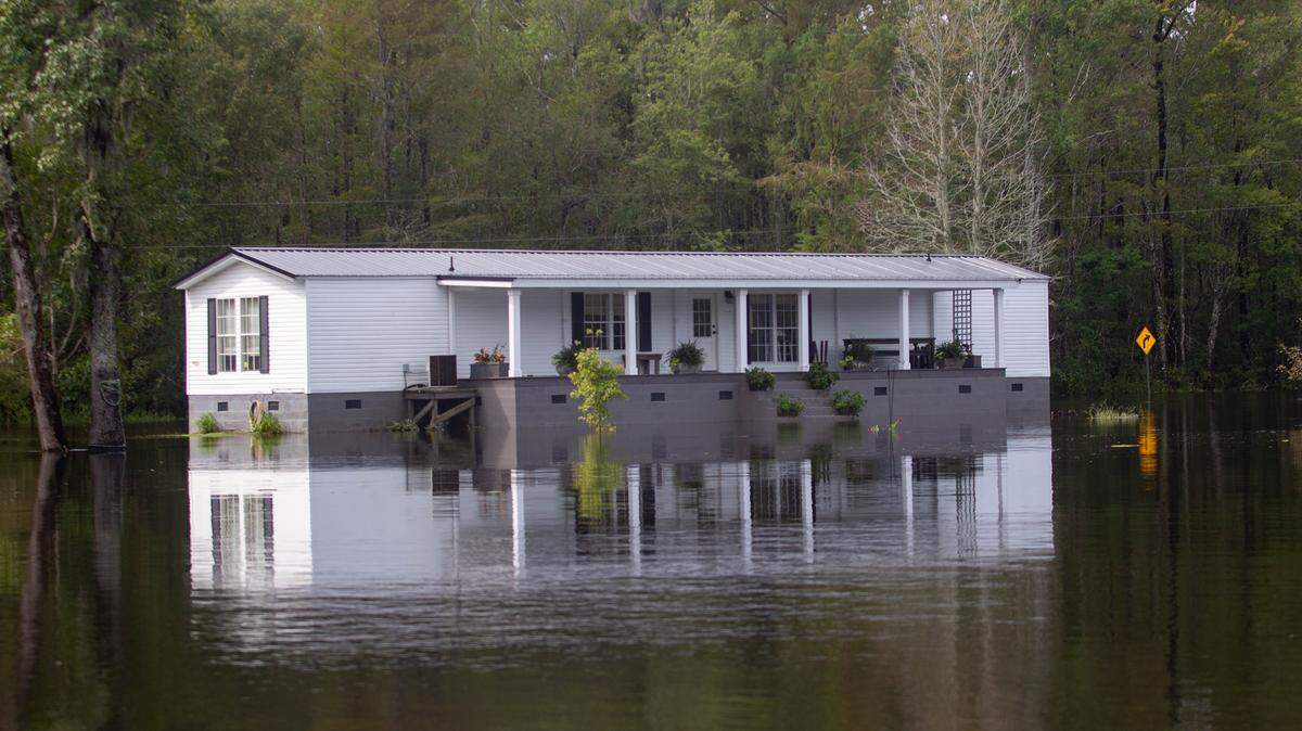 Houses in Conway are already experiencing flooding Monday after Tropical Depression Florence.