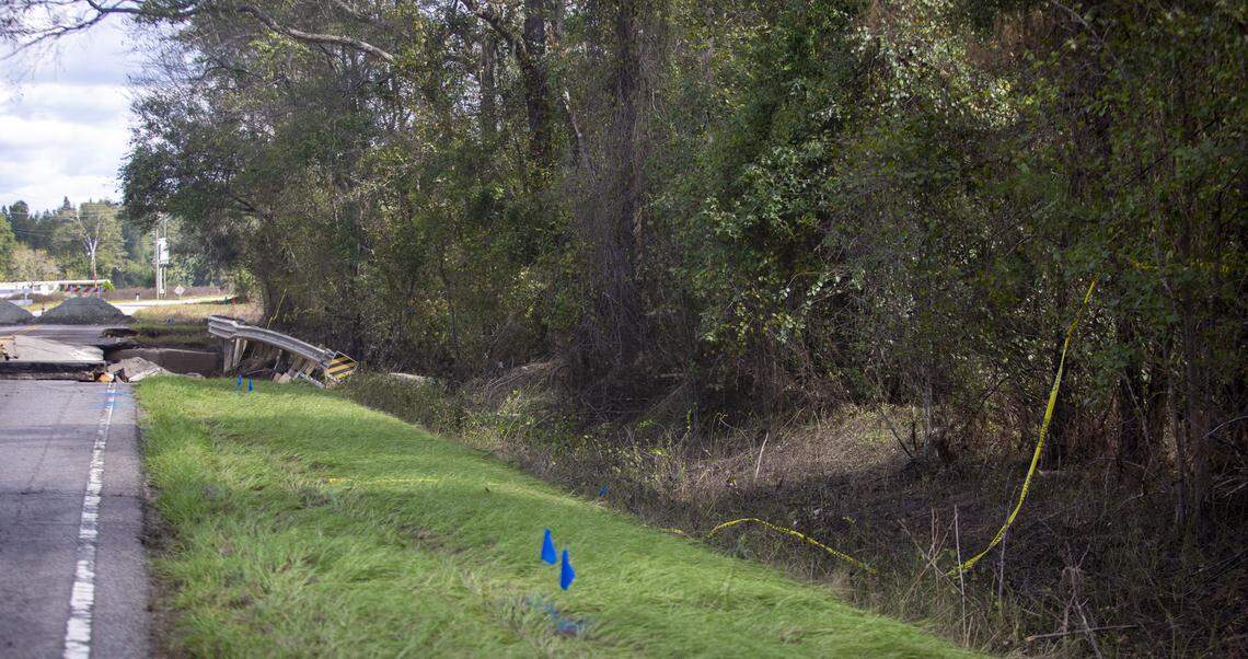 Crime scene tape can be seen along U.S. Highway 76  in Marion County Tuesday. Horry County Sheriff’s deputies were transporting Nicolette Green and Wendy Newton, of Shallotte, N.C., from Conway to medical facilities in Darlington and Lancaster when the transport van was swept into floodwaters along Highway 76.
