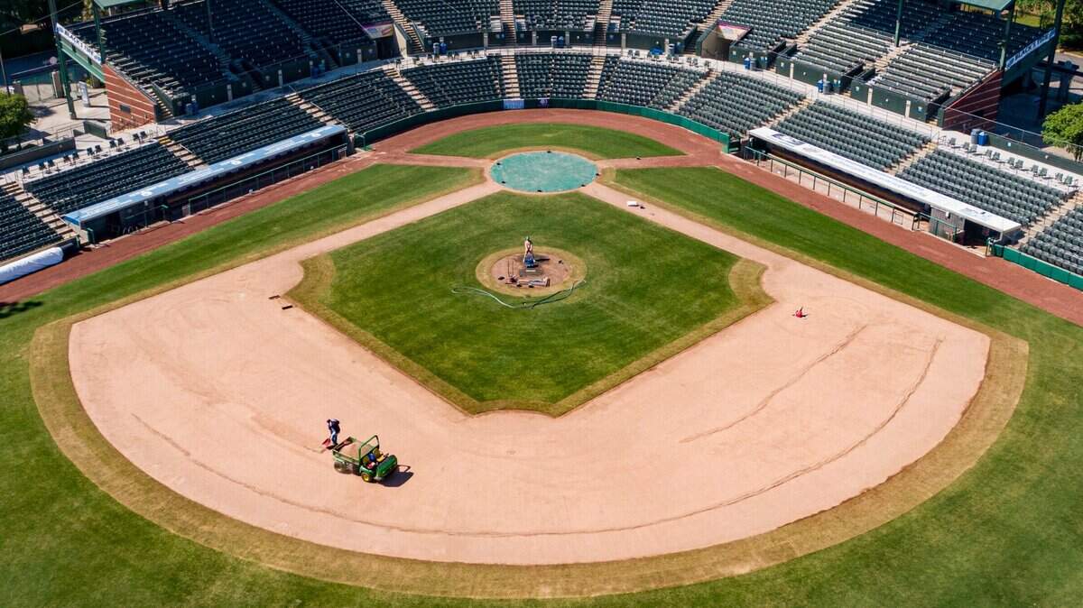 Grounds keepers work to prepare the TicketReturn.com Field at Pelicans Ballpark for the 2021 season on Thursday. The Myrtle Beach Pelicans begin the 2021 season on May 4 and play their home opener on May 11 against the Augusta GreenJackets, Low-A affiliate of the Atlanta Braves. Myrtle Beach will limit attendance due to the coronavirus to 50 percent capacity, or 3,300 spectators, in May at Pelicans Ballpark. April 22, 2021.