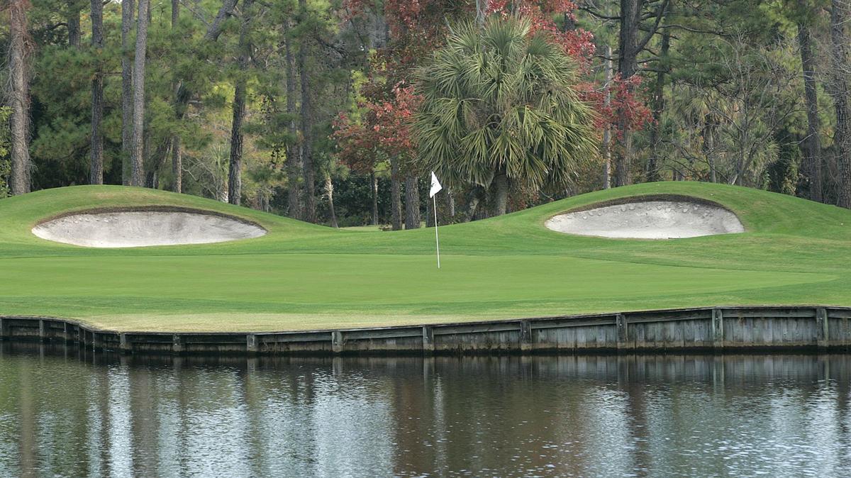 Possum Trot Golf Club’s signature hole is the 203-yard 13th, which features a bulkheaded water hazard fronting the putting surface that gets longer the farther left you go nearly to the back of the green. The green is backed by four bunkers.