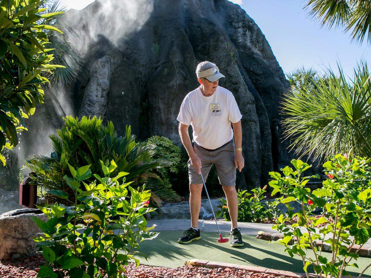 The volcano spews smoke during the tournament at Hawaiian Rumble Mini Golf. The U.S. Pro Mini-Golf Association Masters Championship Tournament is being held at Hawaiian Rumble and Hawaiian Village this week with proceeds benefitting Canine Angels. Sept. 10, 2015.
