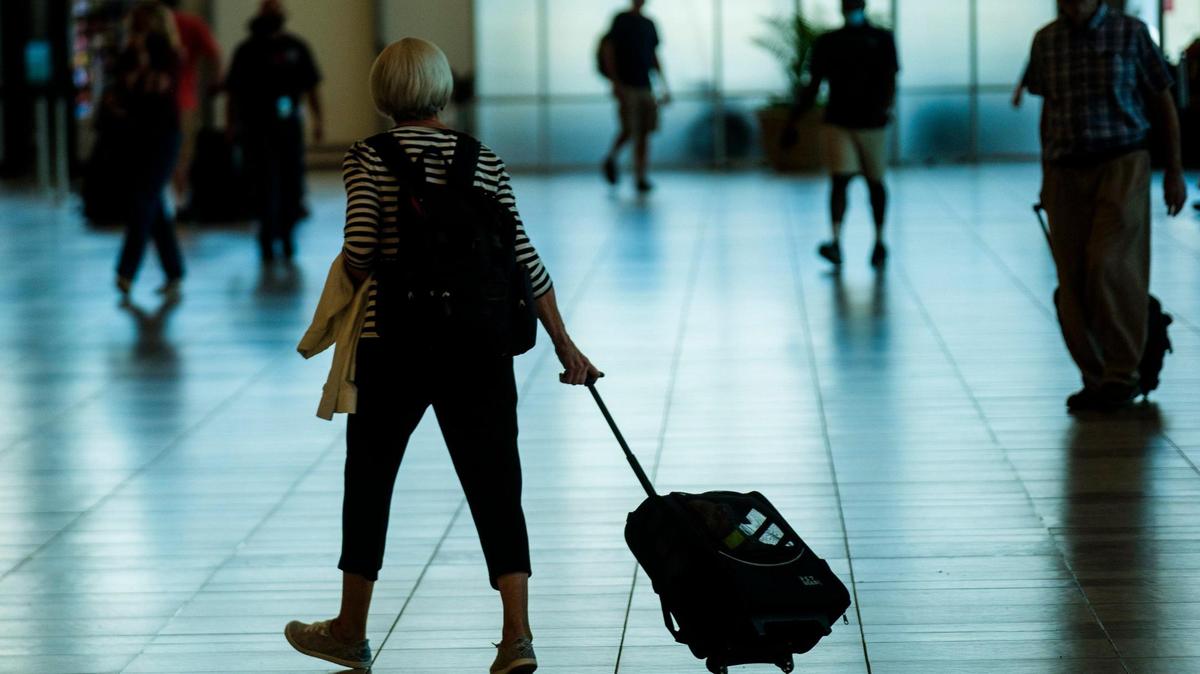 Dozens of flights to and from Myrtle Beach International Airport (MYR) have been canceled this week because of a winter storm. Above, travelers make their way through MYR on Oct. 14, 2021.