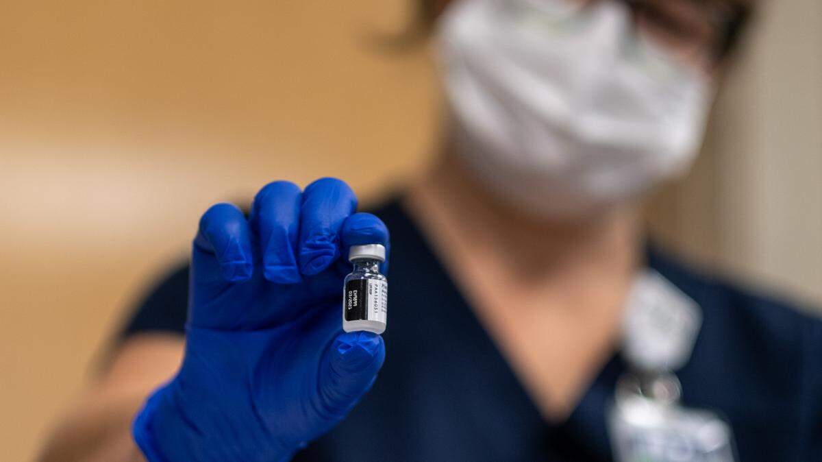 Jennifer Van Aernem, Director of Education at the Conway Medical Center (CMC) holds a vial of the Pfizer issued coronavirus vaccine. The CMC took delivery of 975 doses of the Pfizer issued COVID-19 vaccination on Monday and immediately began vaccinating hospital staff. By Monday afternoon 105 workers had registered to get the two-part vaccination. December 14, 2020.