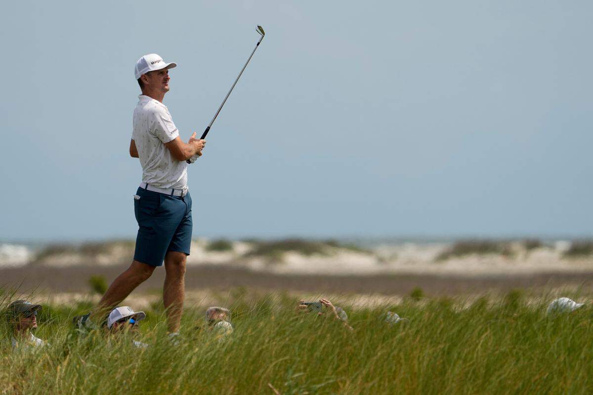 Justin Rose, of England, hits on the eighth hole during a practice round at the PGA Championship golf tournament on the Ocean Course Tuesday, May 18, 2021, in Kiawah Island, S.C. (AP Photo/David J. Phillip)