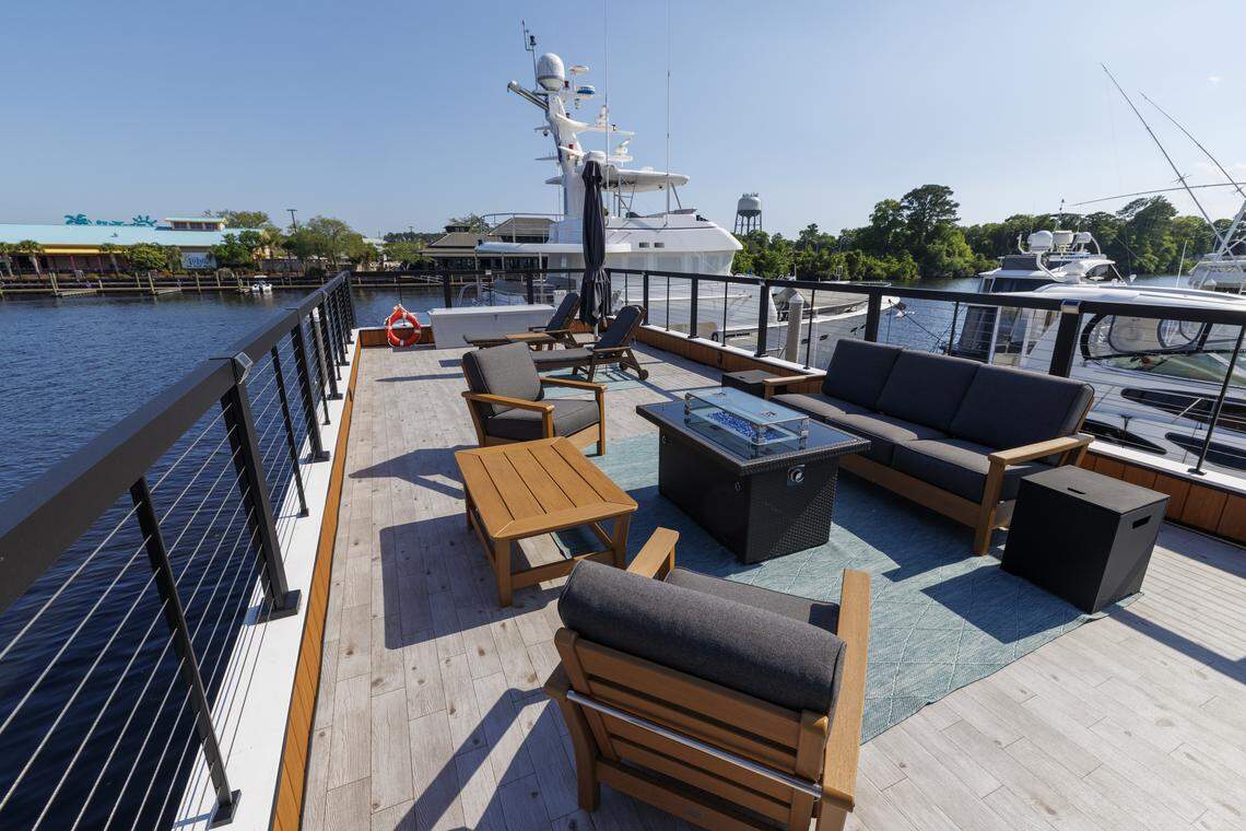 The Palmera, a 53-foot one-bedroom stationary houseboat, is docked at the Barefoot Landing Marina in North Myrtle Beach, SC. The houseboat is equipped for up to four people with a full kitchen and bath as well as a top deck for lounging. April 23, 2026.