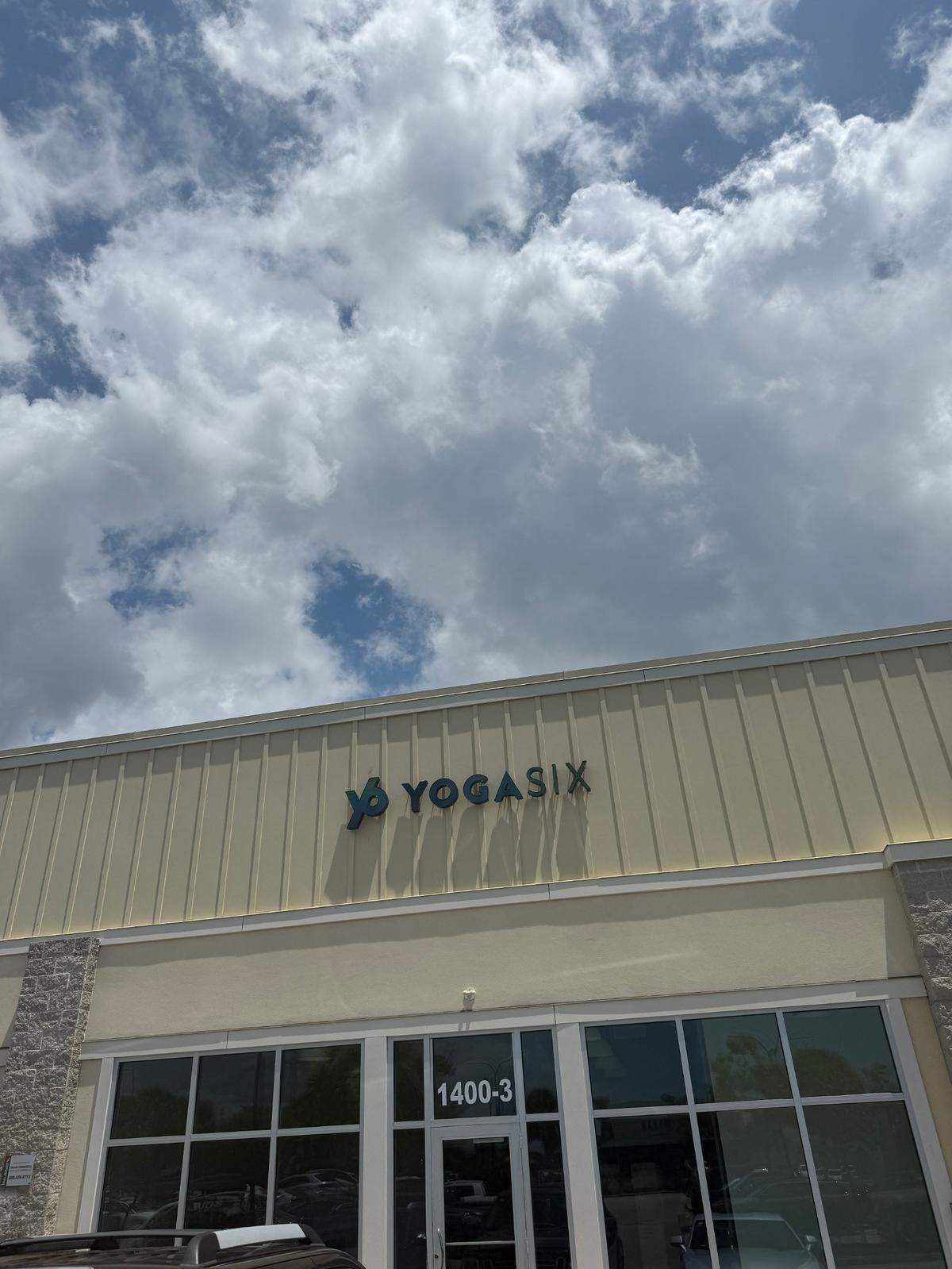 The sign is still out front of the former YogaSix studio in North Myrtle Beach, SC.