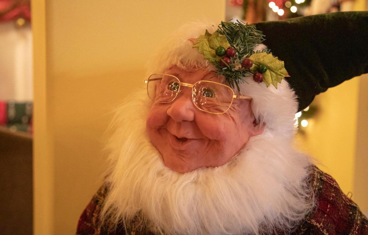 A Christmas figure sits in the foyer to Ella Nixon’s home in Plantation Lakes.