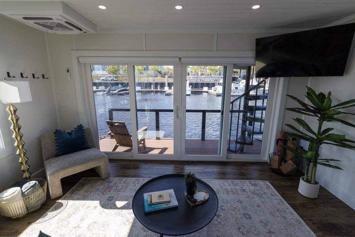 The Palmera, a 53-foot one-bedroom stationary houseboat, is docked at the Barefoot Landing Marina in North Myrtle Beach, SC. The houseboat is equipped for up to four people with a full kitchen and bath as well as a top deck for lounging. April 23, 2026.