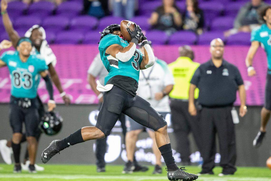 Coastal Carolina wide receiver Aaron Bedgood (3) catches a touchdown pass against Northern Illinois during the Cure Bowl NCAA college football game in Orlando, Fla., Friday, Dec. 17, 2021. (Willie J. Allen Jr./Orlando Sentinel via AP)