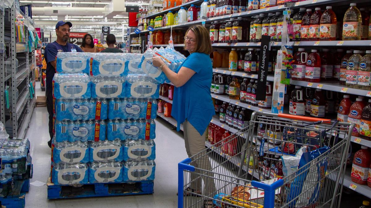 Customers stock up on water at Walmart on Seaboard St. in preparatoin for  Tropical Storm Florence, which is expected to make landfall sometime next week.