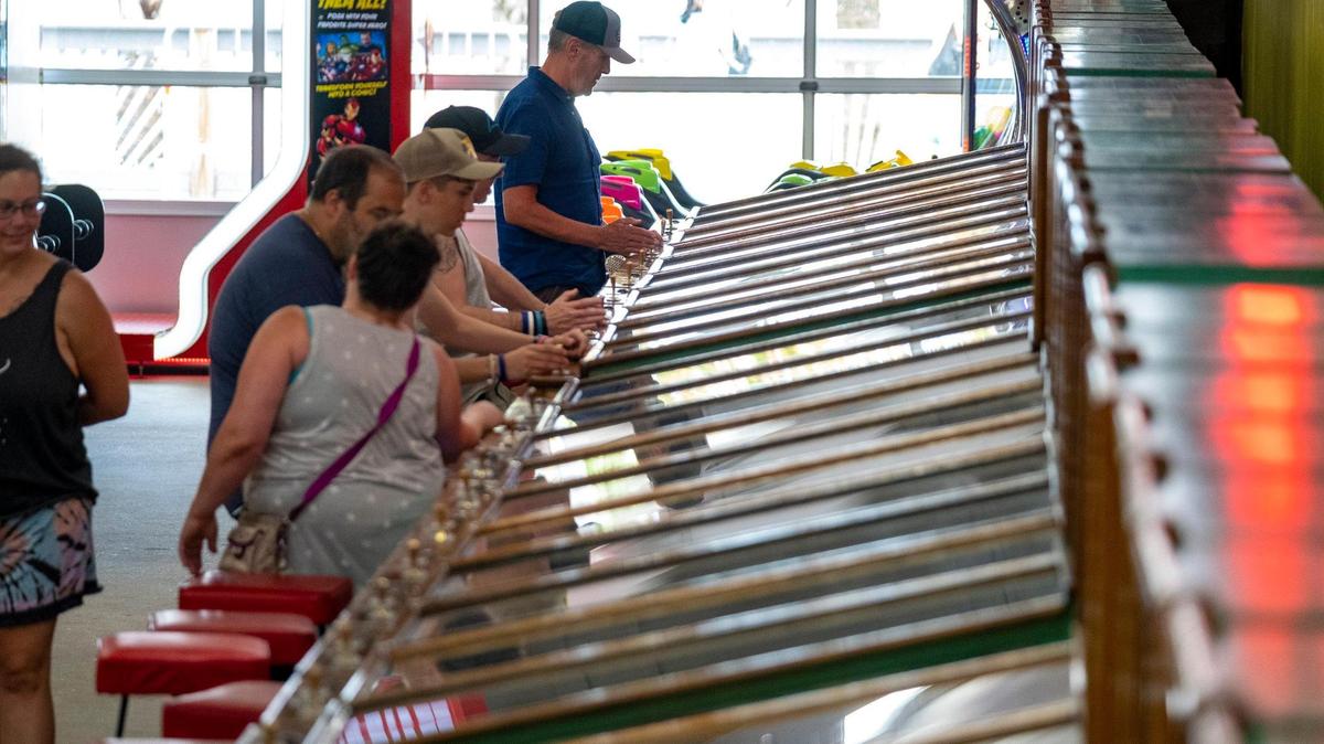 Tourists flock to Myrtle Beach’s landmark Fun Plaza to play classic games such as their 38 1957 Williams Deluxe Baseball. These Myrtle Beach area arcades with their classic games bring back the nostalgia of a bygone era for Grand Strand tourists.July 11, 2022.