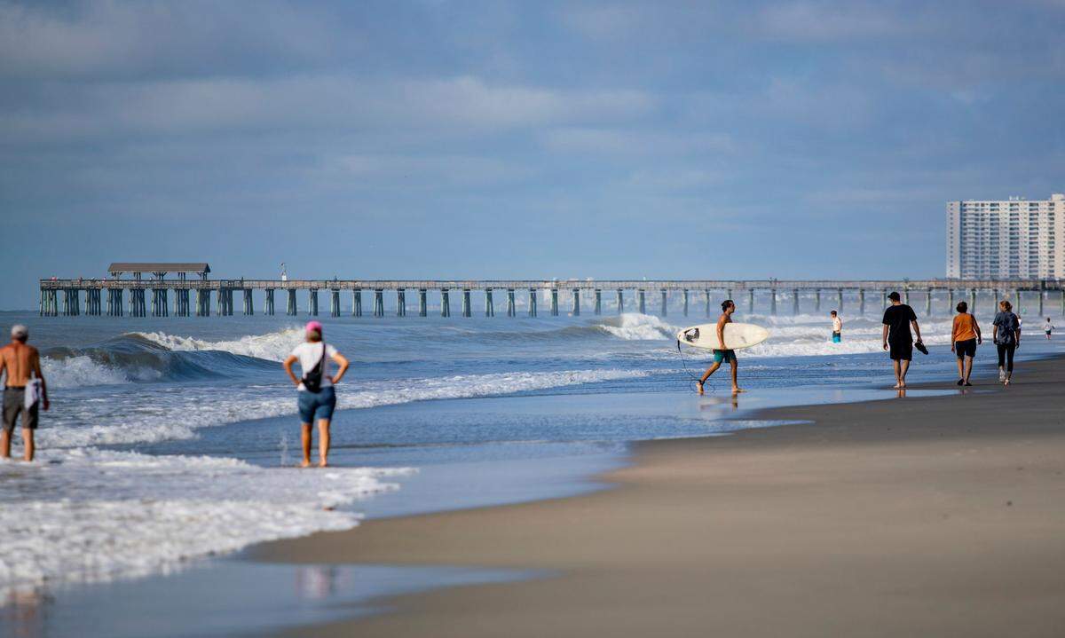 The waves were still high along the beach near Springmaid Pier on Tuesday morning in the wake of Tropical Storm Isaias.